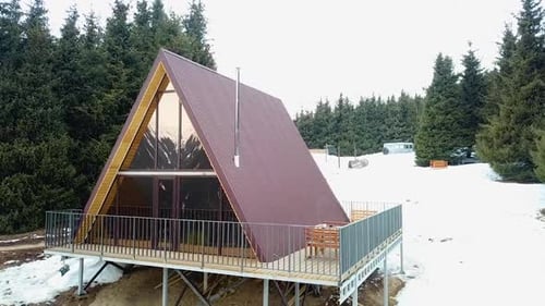 Aerial view of chalet cottages in mountain resort