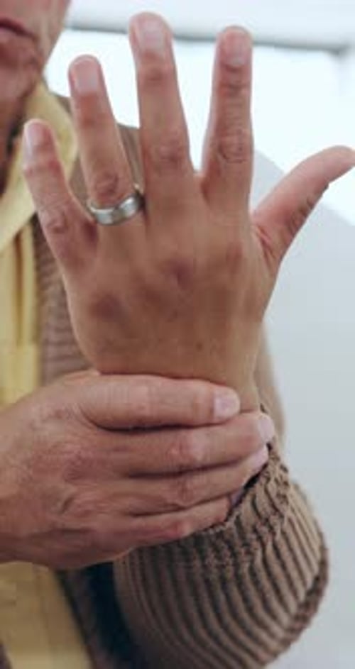 Senior, man or massage hand for arthritis, injury or orthopedic wound at home