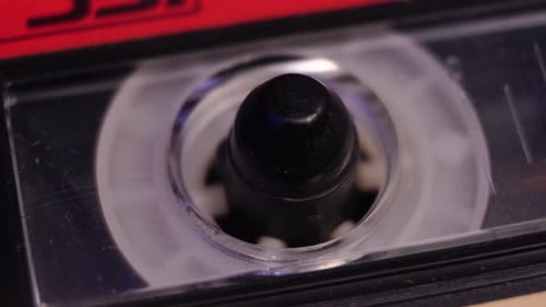 Audio Cassette Tape Close Up, Playing Analog Recording in Vintage Player