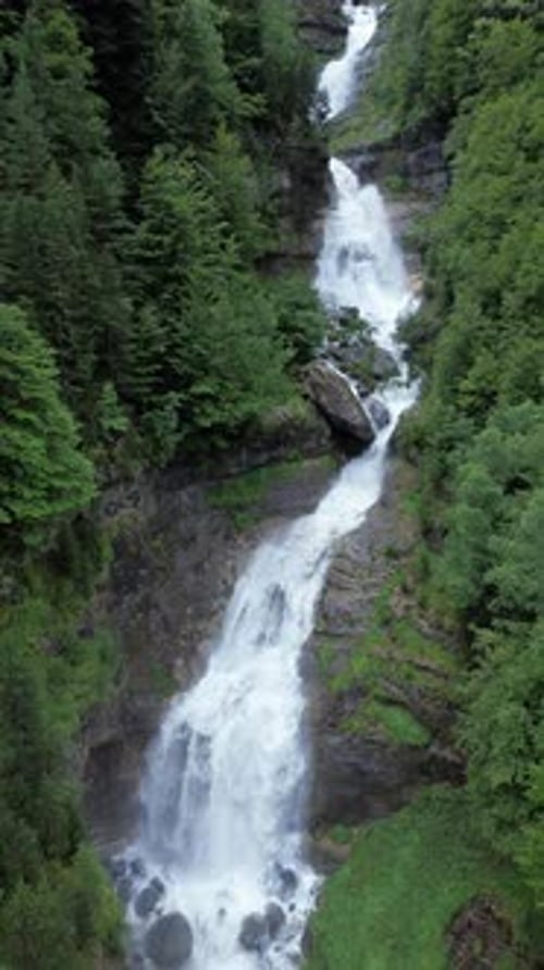 Waterfall background aerial view vertical shot