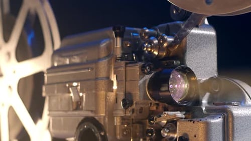 Light Beam Turns on an Old Vintage 16Mm Projector for Watching a Movie in a Cinema Starts the Retro
