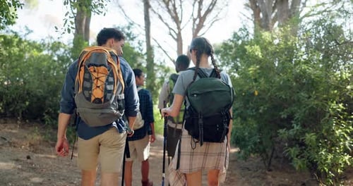 Nature, hiking and group of friends in forest for activity, hobby or backpacking on vacation