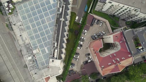 Overhead View Of Empty Street And High-rise Apartment Buildings At Sunrise In Cracow. - aerial