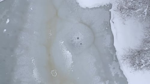 Icy Frozen River in Cold Winter