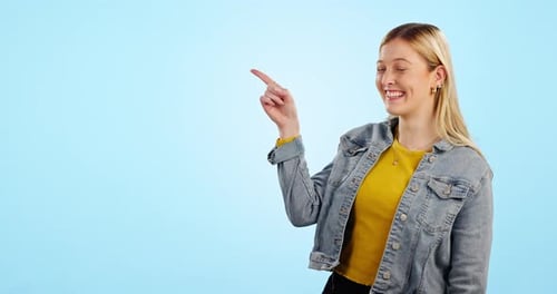 Happy woman, face and advertising choice in studio for comparison feedback