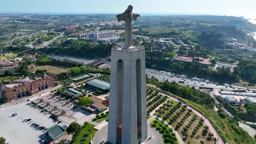 Cristo Rei monument and Almada cityscape from the air