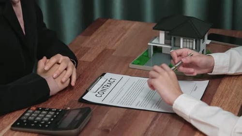 Enthusiastic Client Hand Putting Signature on Official Document