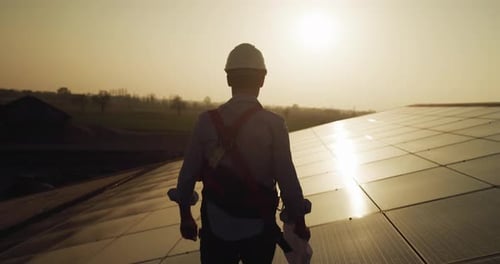 Maintenance assistance technical worker in uniform is smiling satisfied of his work after checking