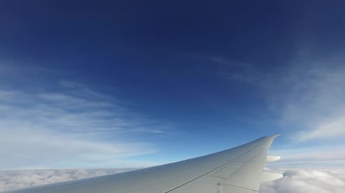 Airplane Wing Above Blue Sky Journey