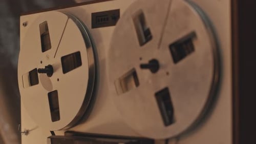 Supply and Take-up Reels Spinning on Retro Reel to Reel Recorder