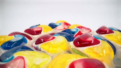 Dishwasher detergent tabs close up on white background isolated 4K