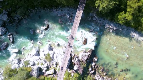 Aerial drone view of a bridge crossing the Soca river in Slovenia