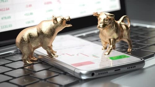 Bull and Bear Symbols of Stock Market on a Smartphone with Stock Market Data Application