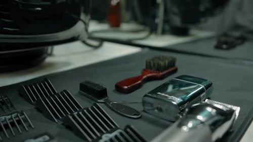 The Hairdresser's Tools are Laid Flat on the Table