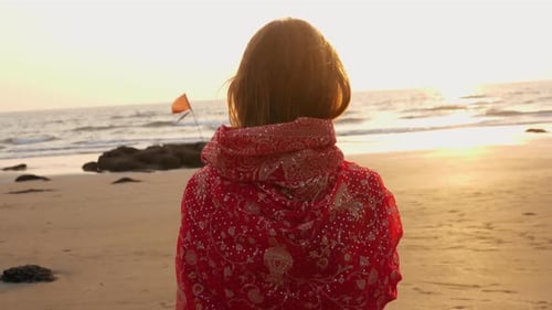 Young Women Wearing a Red Saree on the Beach Goa India