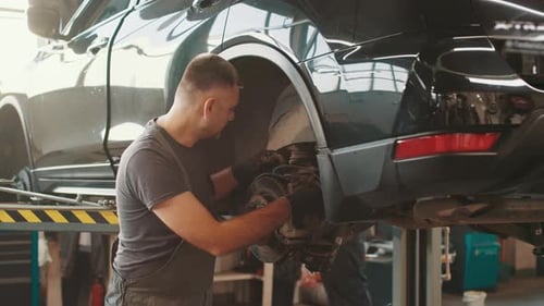 Selective Focus Disc Brake on Car Car Brake Repairing in Garage