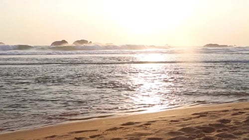 Ocean View In Hikkaduwa In Sunset With Waves Splashing The Beach. 2