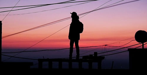 Guy on the Roof at Sunset