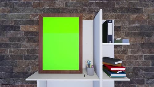 Empty photo frame with chroma key green screen, on book shelf with stationary - HD