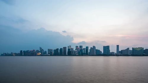 Timelapse of city skyline from day to night in hangzhou china