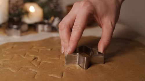The Process of Decorating Christmas Cookies is in Motion