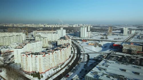 City quarters. Multi-story houses. Winter cityscape.