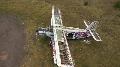Old abandoned airplane in the field