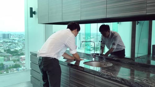 Happy Asian businessman washing hands for corona virus prevention, hygiene