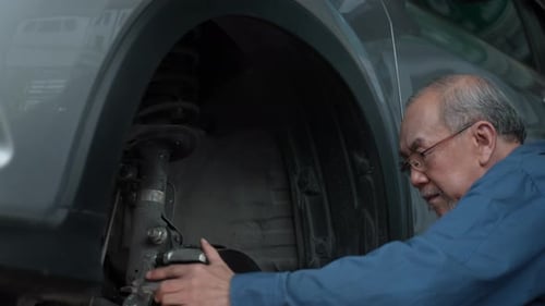 Male mechanic checking and repair motor car garage service, automobile technician man maintenance