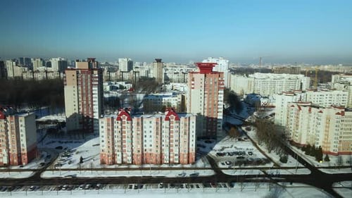 City quarters. Multi-story houses. Winter cityscape.