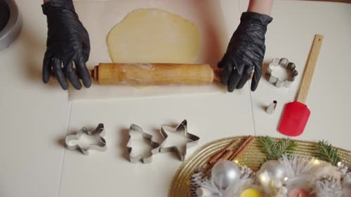 Rolls Out the Dough on the Kitchen Table