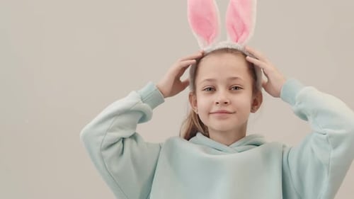 Portrait of Little Girl Wearing Bunny Ears