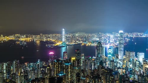 Timelapse of city skyline from day to night in hong kong china