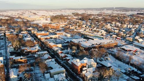 AERIAL High Above Township Of Lititz, PA During Snowfall In Winter