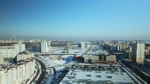 City quarters. Multi-story houses. Winter cityscape.