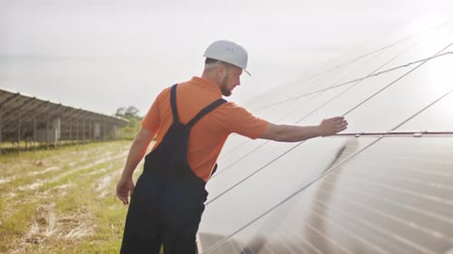 Assistance Technical Worker in Uniform is Checking an Operation and Efficiency