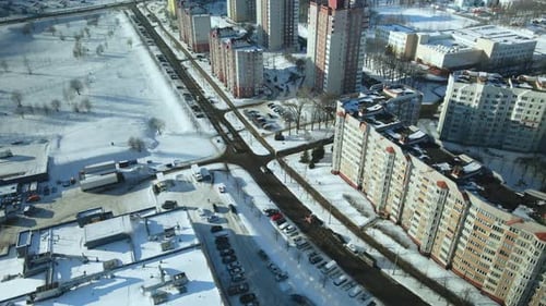 City quarters. Multi-story houses. Winter cityscape.
