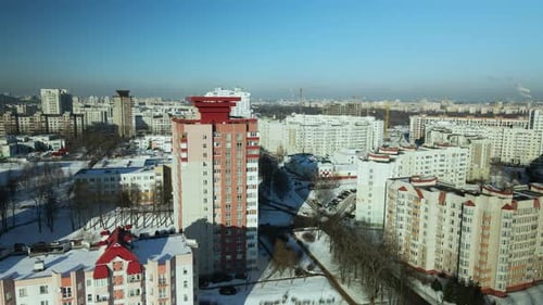 City quarters. Multi-story houses. Winter cityscape.