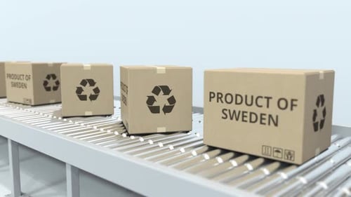 Cartons with PRODUCT OF SWEDEN Text on Roller Conveyor