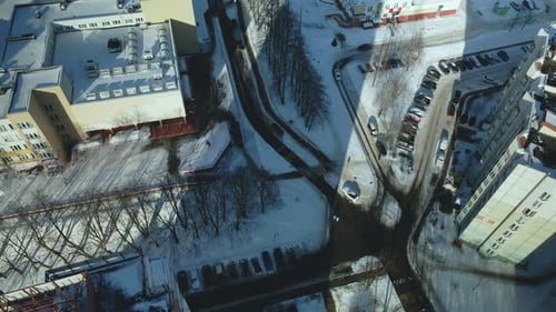 City quarters. Multi-story houses. Winter cityscape.