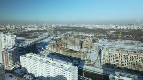 City quarters. Multi-story houses. Winter cityscape.