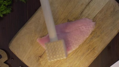 Flat Lay Shot: the Cook Makes a Chop of Chicken Fillet on the Wooden Board, Chef Prepares Meat