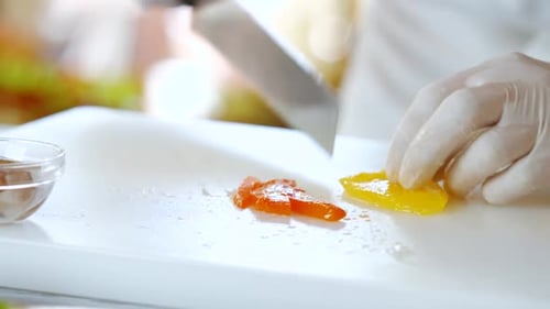 Kitchen Knife Cuts Pepper.