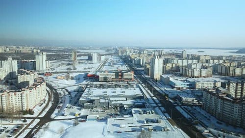 City quarters. Multi-story houses. Winter cityscape.