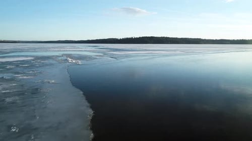 Flying Over Frozen Lake Ice