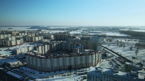 City quarters. Multi-story houses. Winter cityscape.