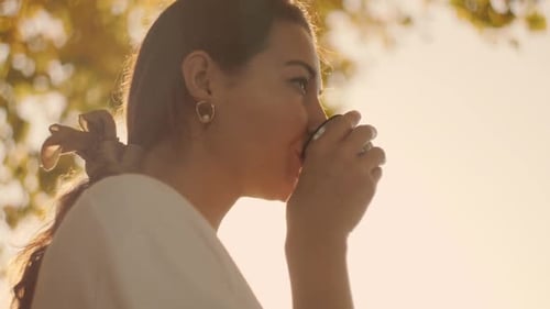 Woman in Autumn Park
