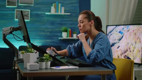 Professional Editor Using Touch Screen Computer Retouching Pictures