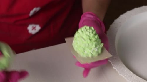 A Woman Makes Cones From Marshmallows.
