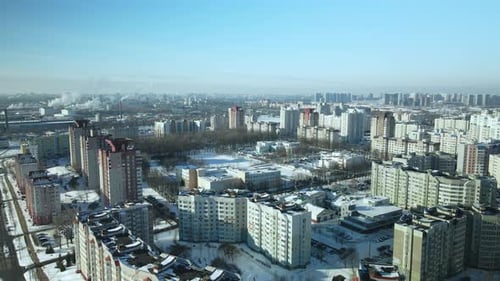 City quarters. Multi-story houses. Winter cityscape.